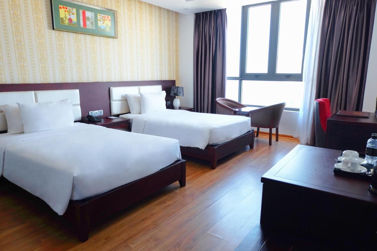 Le Hoang Beach Hotel Danang Extérieur photo