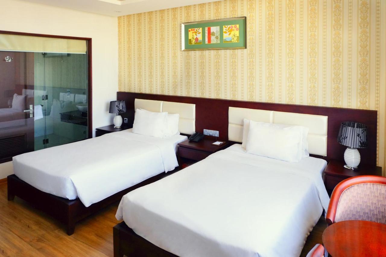 Le Hoang Beach Hotel Danang Extérieur photo