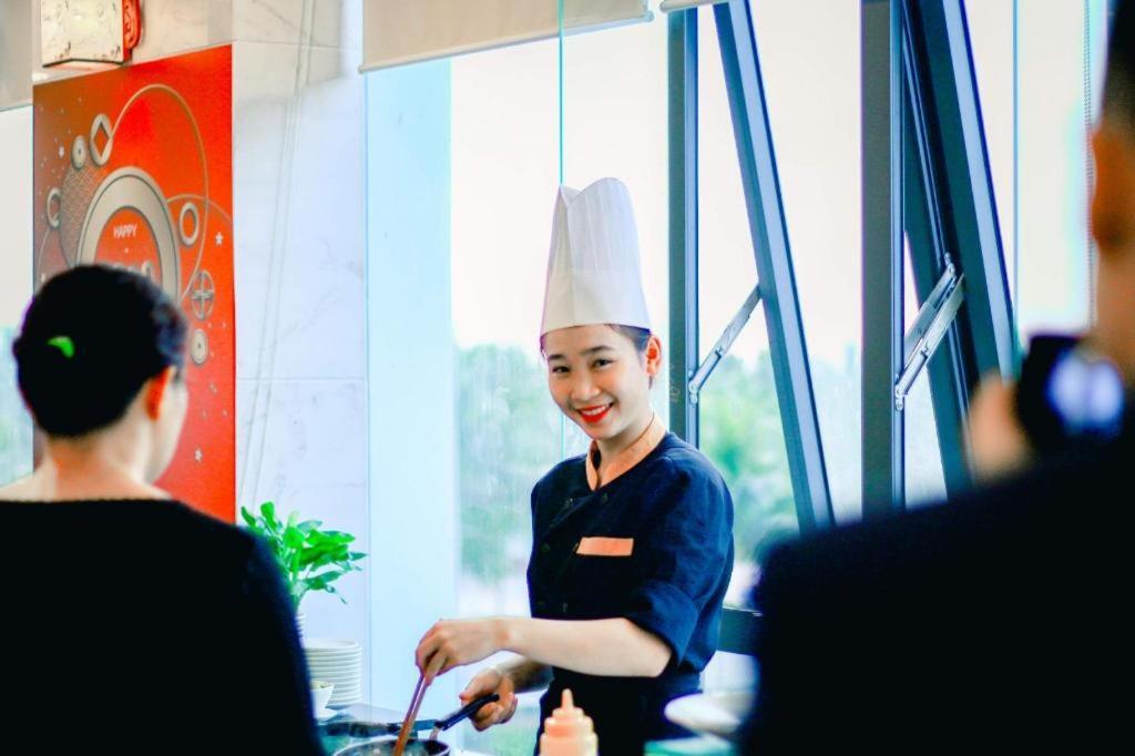 Le Hoang Beach Hotel Danang Extérieur photo